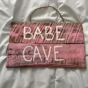 babe cave wooden sign